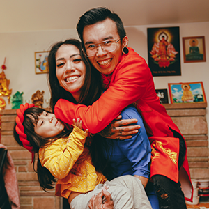 A family posing for a photo.